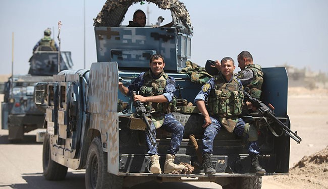 Iraqi security forces patrol the Garma district, west of the Iraqi capital Baghdad in the Anbar province's eastern edge, where pro-government forces say they have recently made advances on areas held by terrorist from ISIS group.