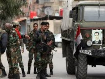 The countrymen of al-Sheikh Moqsoud fights with Syrian Army against the insurgents