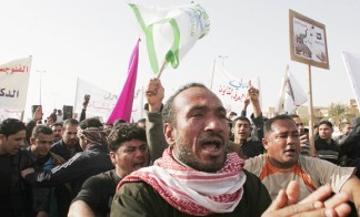 Protesters call for Iraqi PM Maliki's resignation during a demonstration in Falluja