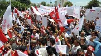 100s of Tunisians hold demo over controversial draft law