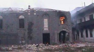 Terrorists in Old Homs burned the church of #Um_Alzinar in #Hamidiya before leaving the district .