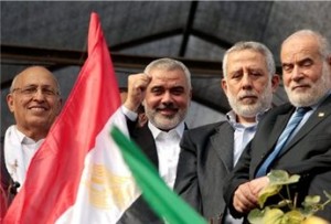 Palestinian leaders in Gaza, Nabeel Sha'ath, Ismail Haniyya, Muhammed Al-Hindi, and Ahmed Bahar celebrate victory, November 22, 2012 maan