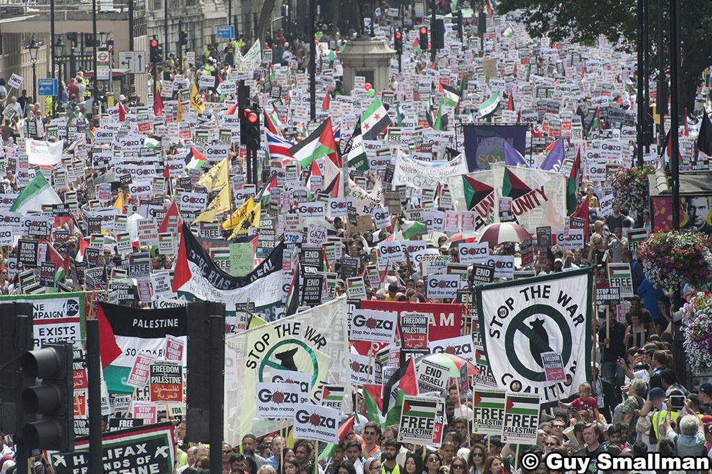 National demonstration in London called over the bombing of Gaza by Israeli forces. The protest called by the Stop the War Coalition, The Palestinian Soldidarity Campaign, CND, War on Want, BMI, IFE and Friends of Al Aqsa marcheds from Downing street to t